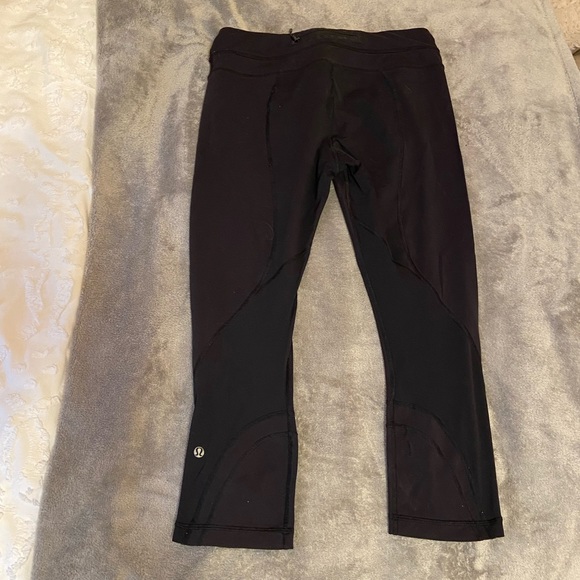 Black Lululemon Cropped 17” leggings. - Picture 2 of 3